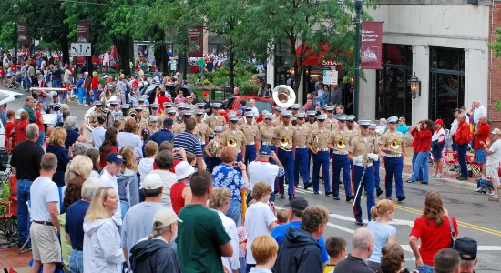 Marine Forces Band: Marine Forces band in khaki uniforms marching downtown